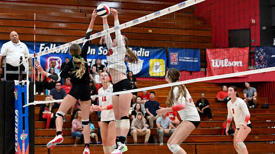 Tampa Carrollwood Day junior Lorelei Church (26) blocks a putback from Miami Westminster Christian during the Class 3A state championship match on Thursday at the FHSAA girls volleyball state finals at Polk State College in Winter Haven.  